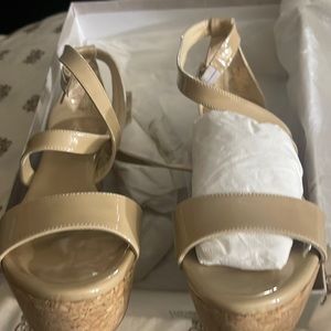 Jimmy Choo brand new. Never been worn. Come with dust bag